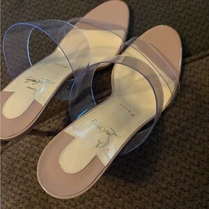 Brand New woman Christian  Louboutin heels Never worn box included.